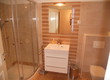 Roomy bathroom with shower and toilet